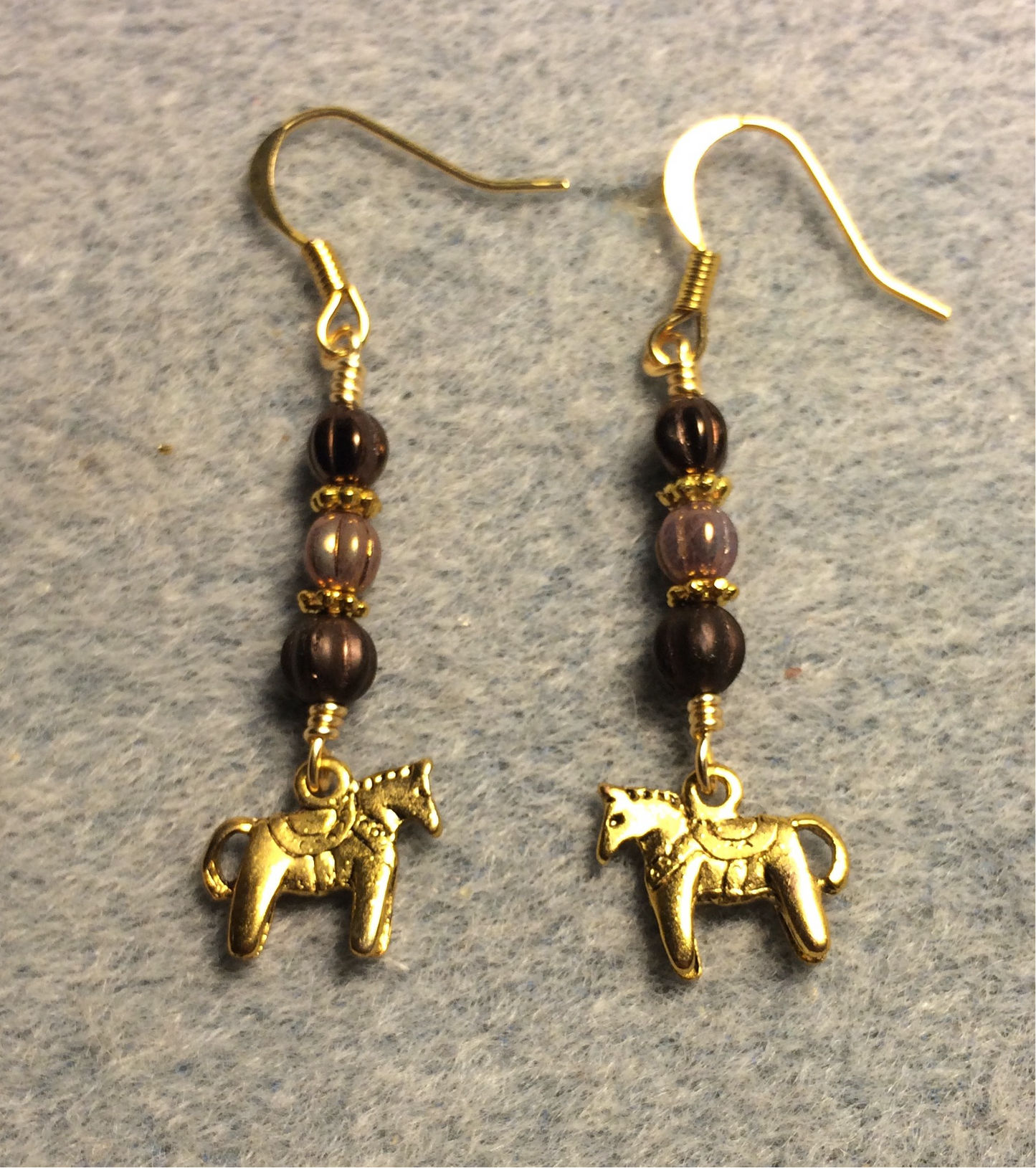Small gold horse charm earrings adorned with small brown Czech glass melon beads