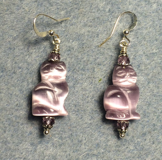 Violet fiber optic (cat’s eye) cat bead earrings adorned with violet Chinese crystal beads.