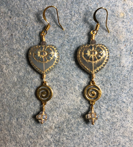 Light blue gray (with gold inlay) Czech glass heart bead earrings adorned with gold swirly links and light blue Czech glass Saturn beads.