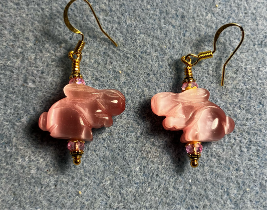 Pink fiber optic (cat’s eye) rabbit bead earrings adorned with pink Chinese crystal beads.