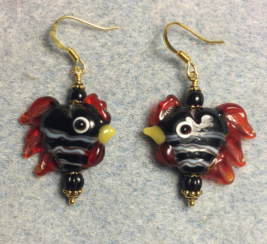 Black with white stripes heart shaped lamp work rooster bead earrings adorned with black Czech glass beads.