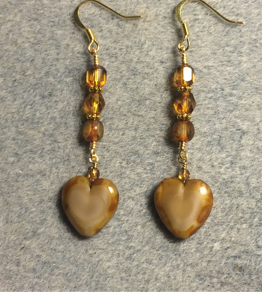 Opaque caramel Czech glass heart bead earrings adorned with caramel Czech glass beads.