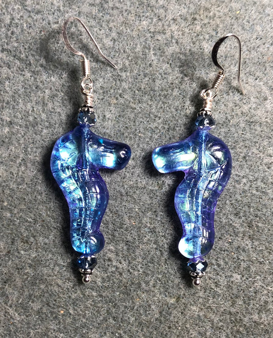 Shimmery light blue Czech glass seahorse bead earrings adorned with light blue Chinese crystal beads.