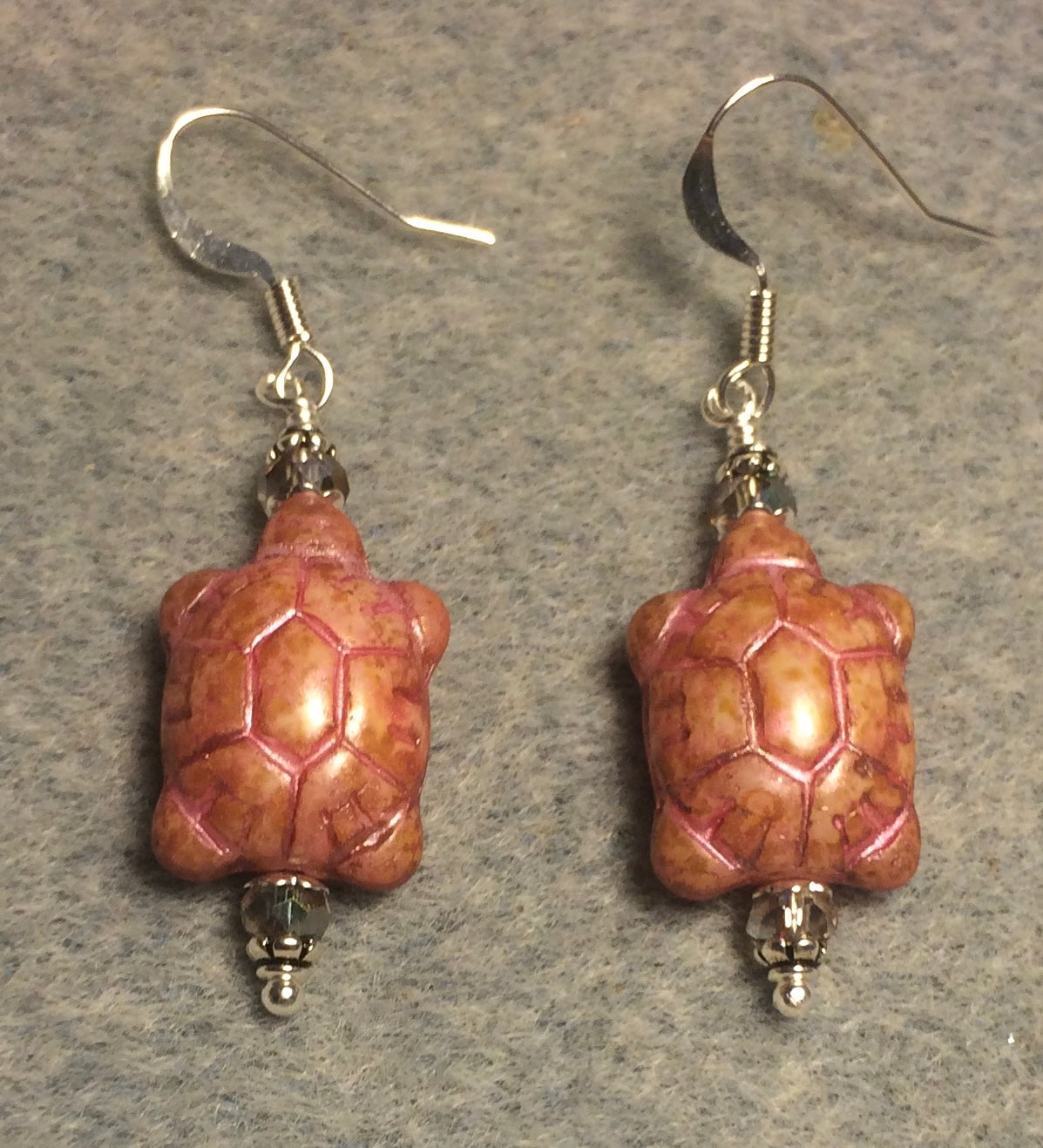 Pink alabaster Czech glass turtle bead earrings adorned with pink Chinese crystal beads.