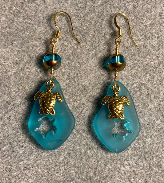 Turquoise sea glass sea turtle pendant bead earrings adorned with gold sea turtle charms and turquoise and gold Czech glass beads.