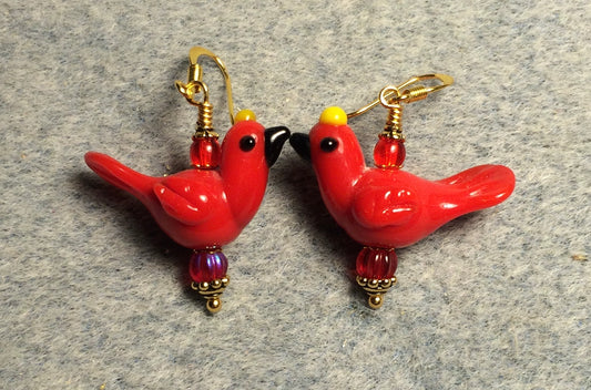 Opaque red lamp work songbird bead earrings adorned with red Czech glass beads.