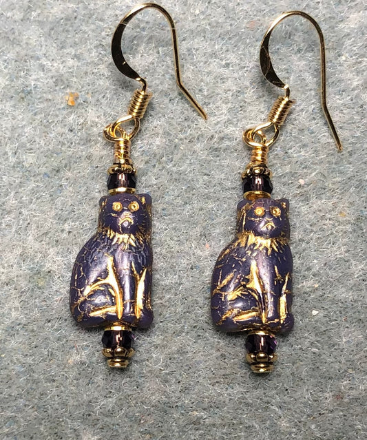 Small opaque purple (with gold inlay) Czech glass cat bead earrings adorned with purple Chinese crystal beads.