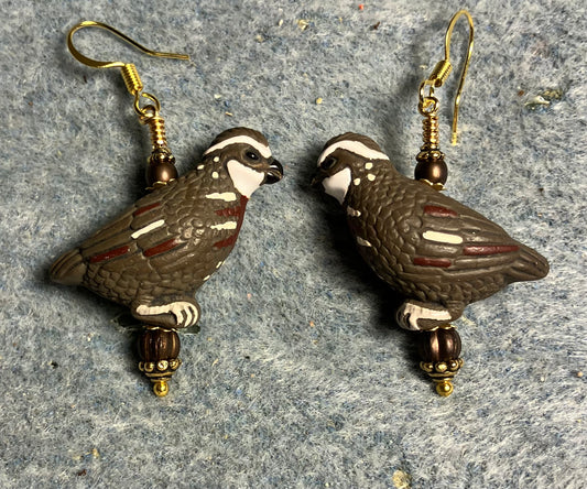 Large brown and white ceramic partridge bead earrings adorned with brown Czech glass beads.