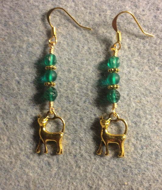 Small gold cat charm earrings adorned with small teal Czech glass beads