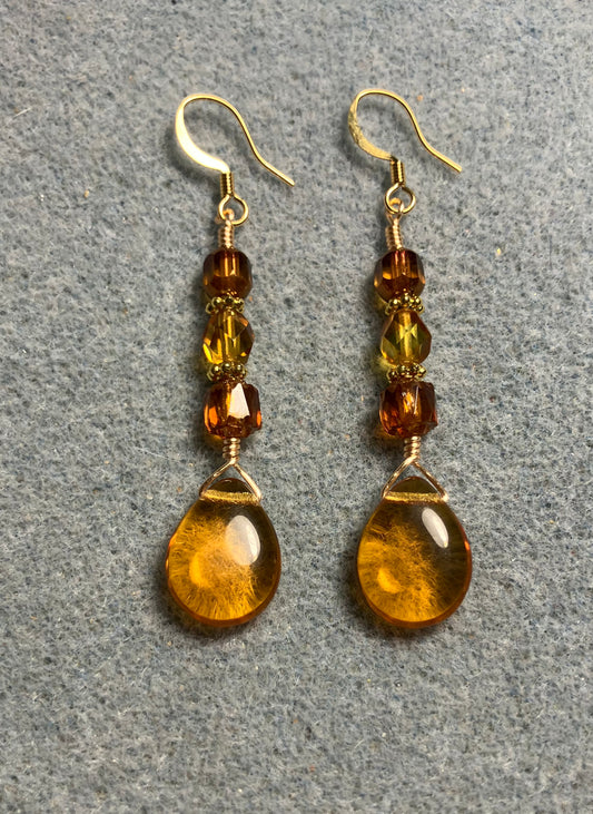 Amber Czech glass pear drop bead earrings adorned with  amber Czech glass beads.