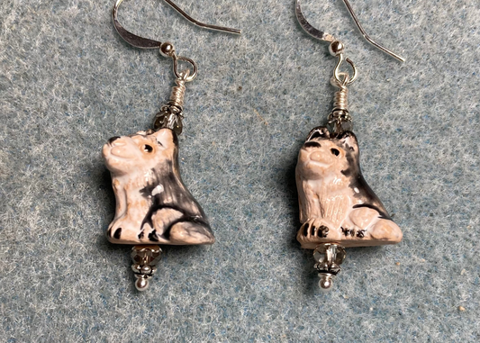 Small gray and white ceramic Siberian Husky bead earrings adorned with gray Chinese crystal beads.