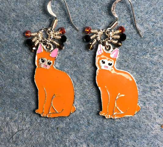 Orange enamel tabby cat charm earrings adorned with tiny dangling orange, black, and brown Chinese crystal beads.
