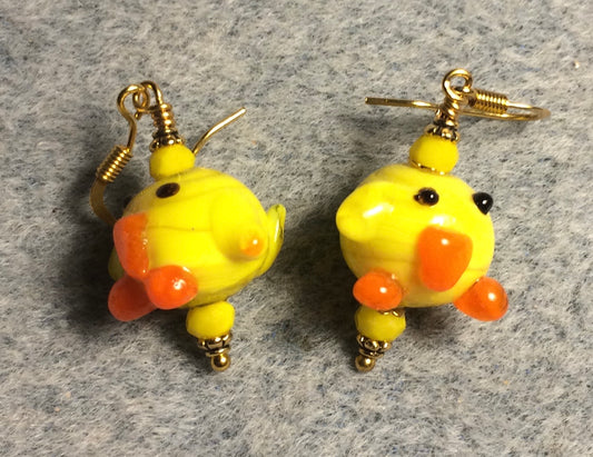 Silly yellow and orange lamp work chicken bead earrings adorned with yellow Chinese crystal beads.