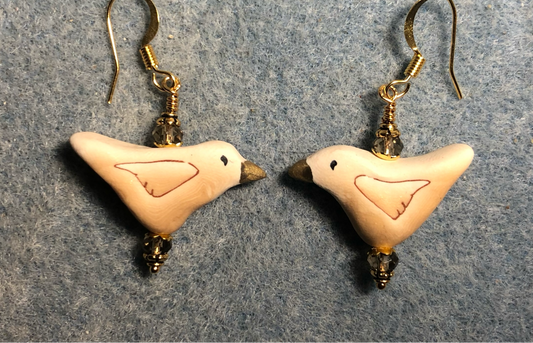 Tan polymer clay bird bead earrings adorned with tan Chinese crystal beads.