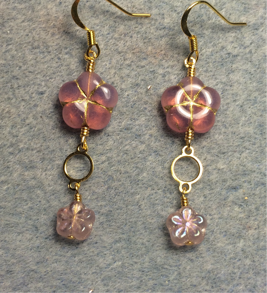 Milky pink Czech glass puffy flower bead earrings adorned with gold circle connectors and small milky pink Czech glass daisy beads.