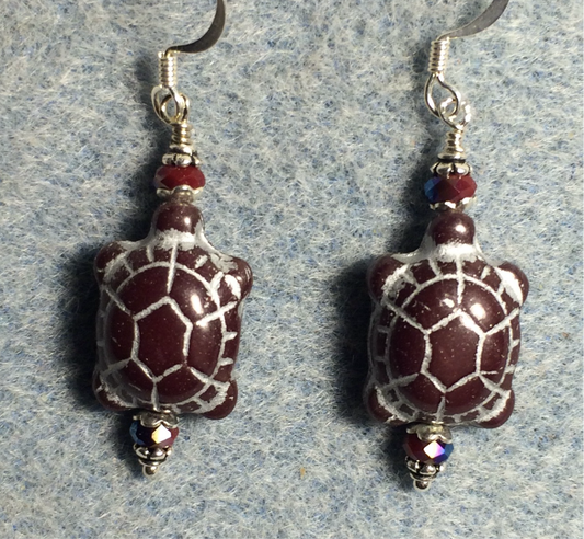 Opaque brown (with silver inlay) Czech glass turtle bead earrings adorned with brown Chinese crystal beads.