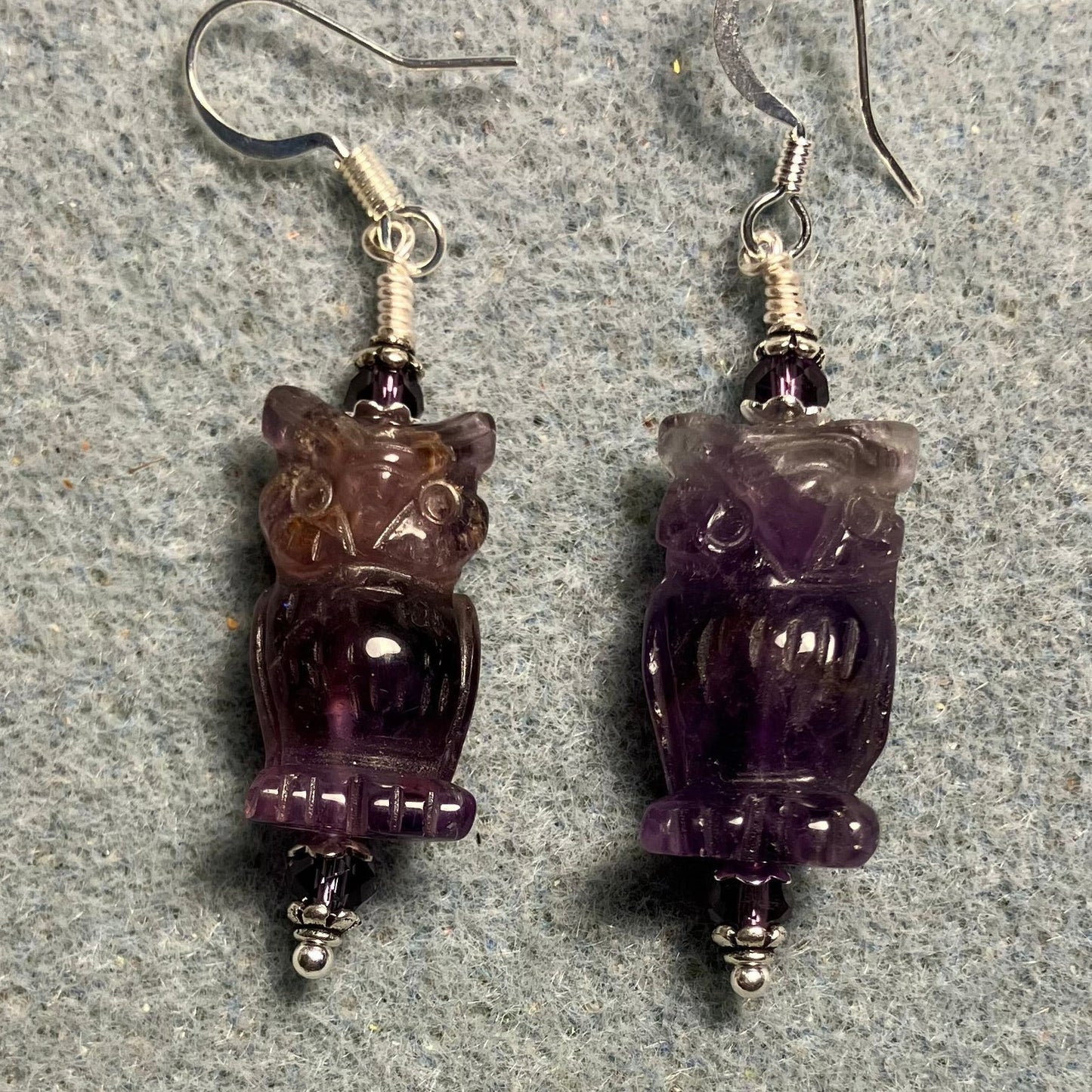 Genuine amethyst gemstone owl bead earrings adorned with  purple Chinese crystal beads.