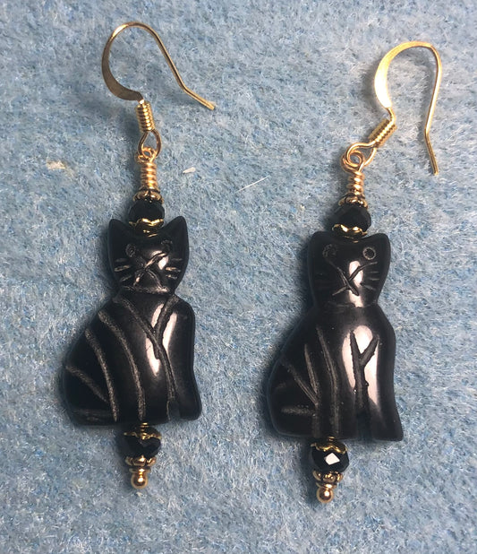 Vintage black onyx gemstone cat bead earrings adorned with black Chinese crystal beads.