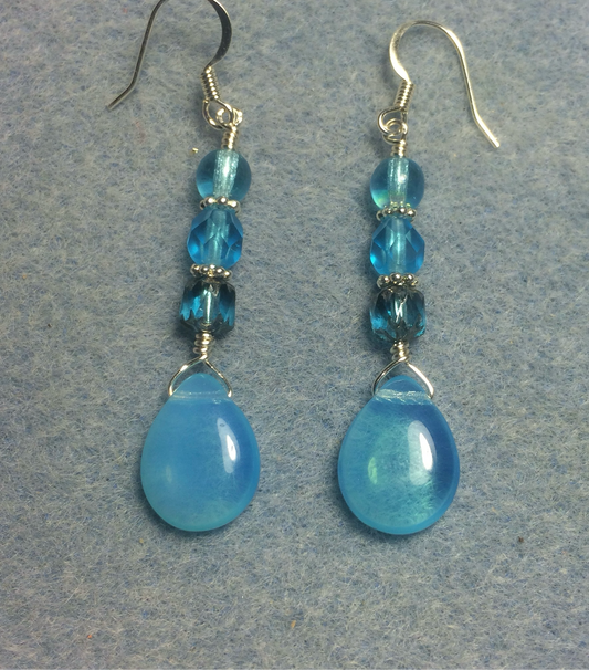 Turquoise Czech glass pear drop bead earrings adorned with turquoise Czech glass beads.