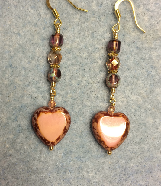 Opaque peach Czech glass heart bead earrings adorned with peach pink Czech glass beads.