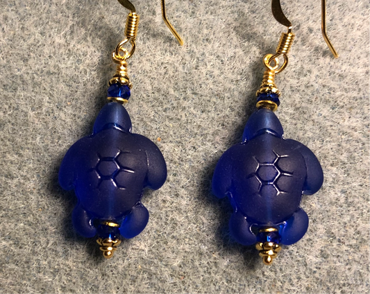 Dark blue sea glass sea turtle bead earrings adorned with dark  blue Chinese crystal beads.