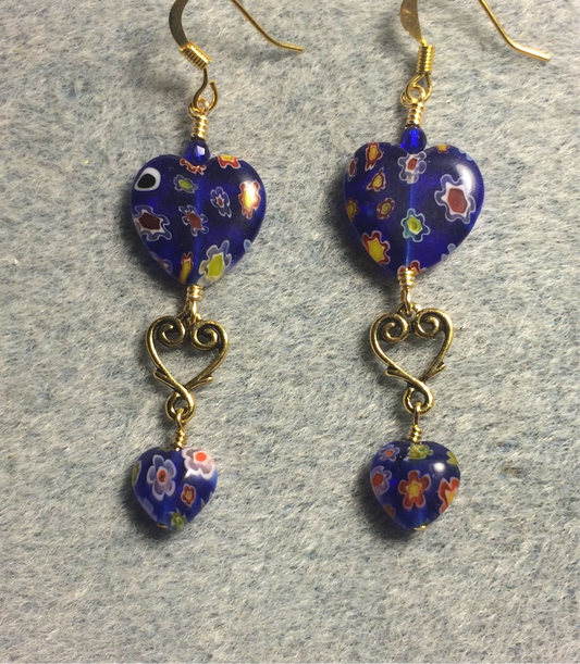Large and small matching dark blue millefiori glass heart bead earrings joined by gold Tierracast heart connectors.