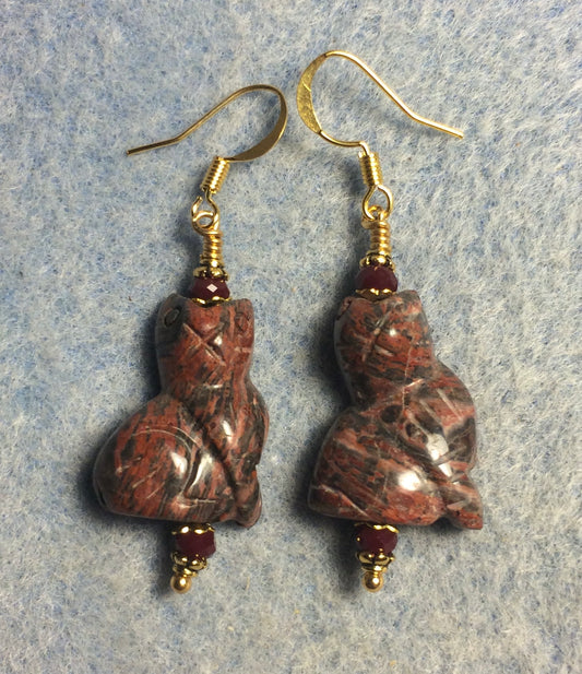 Reddish leopard skin jasper gemstone cat bead earrings adorned with dark red Chinese crystal beads.
