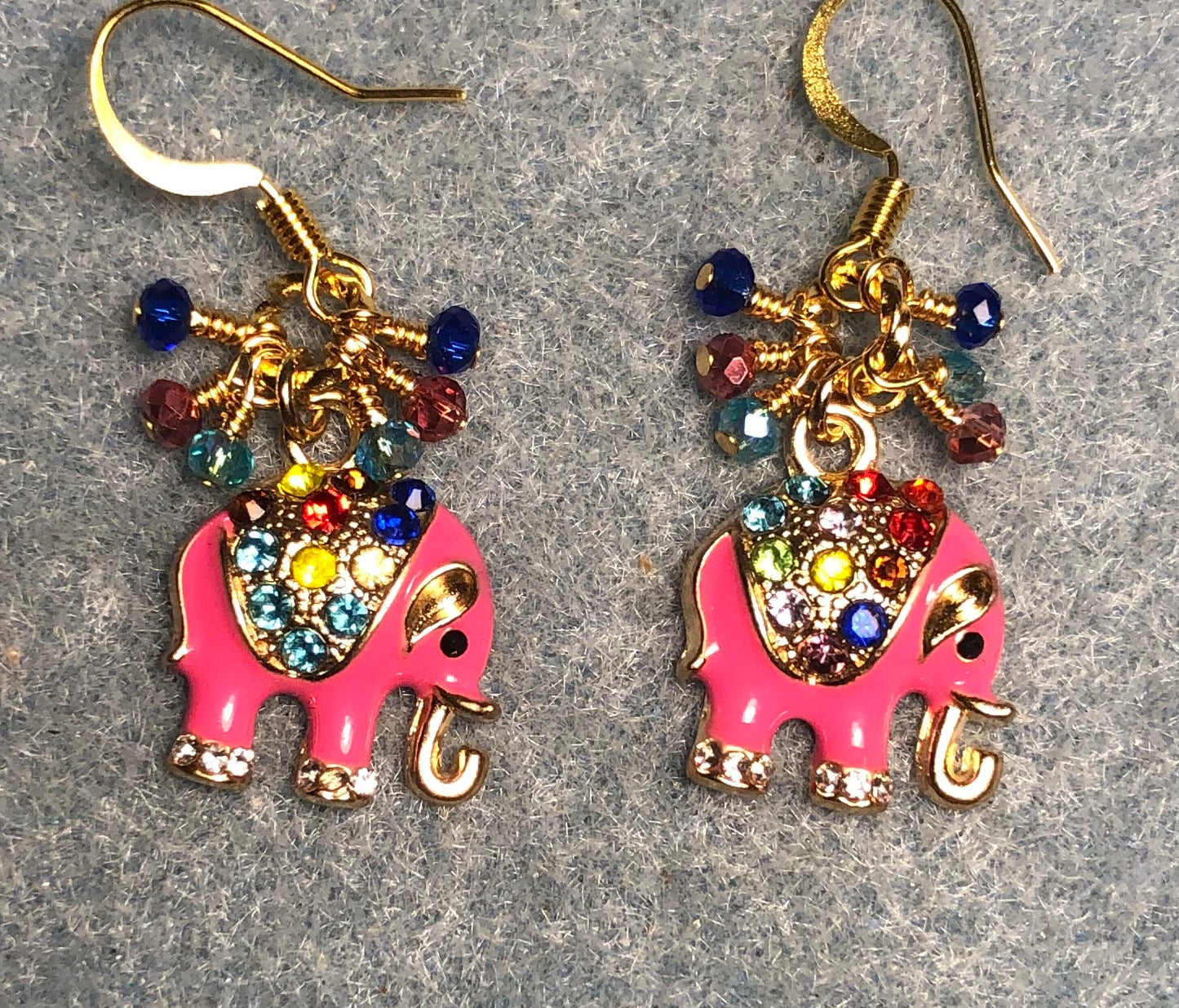 Hot pink enamel and colorful rhinestone elephant charm earrings adorned with tiny dangling blue, pink, and aqua Chinese crystal beads.