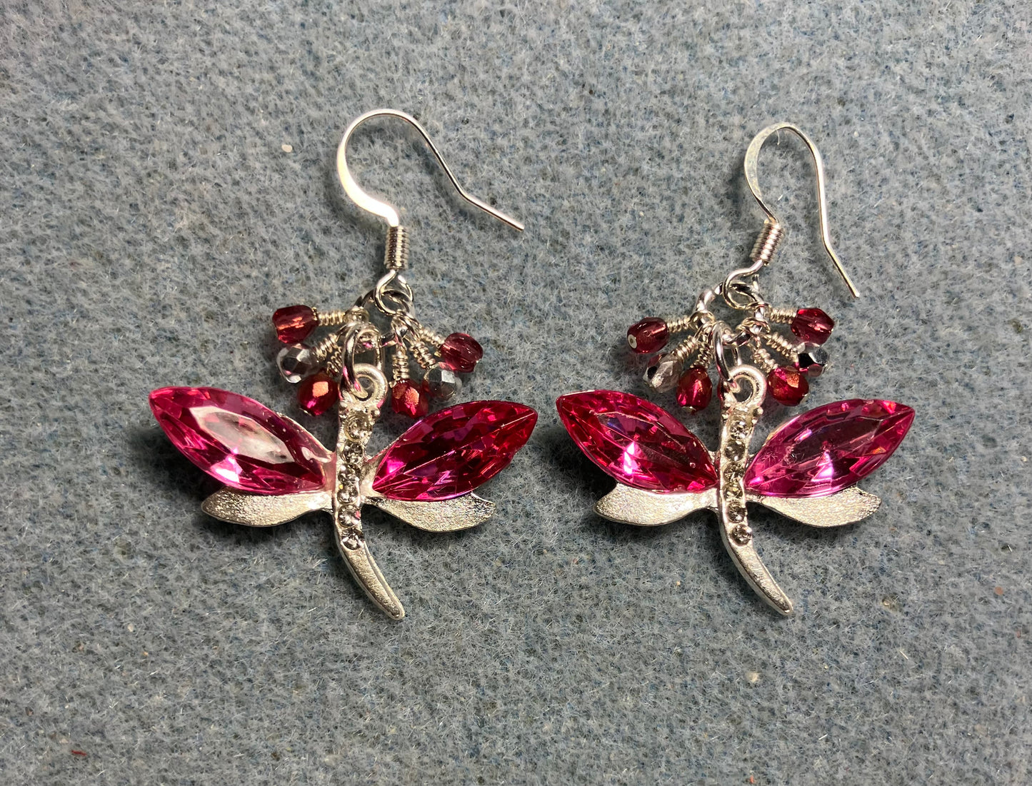 Hot pink and silver rhinestone dragonfly charm earrings adorned with small dangling hot pink and silver Czech glass beads.