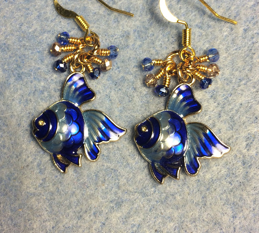 Dark blue and light blue enamel angelfish charm earrings adorned with tiny dangling dark blue, light blue, and gold Chinese crystal beads.