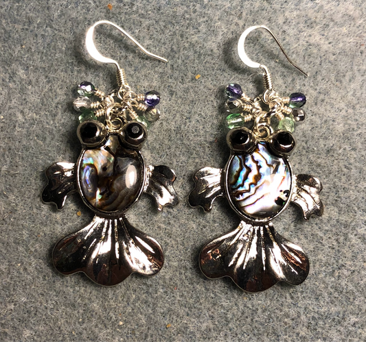 Silver and abalone goldfish charm earrings adorned with small dangling green, silver, and violet beads.