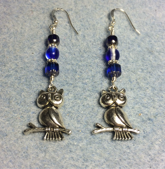 Silver owl charm earrings adorned with dark blue Czech glass beads