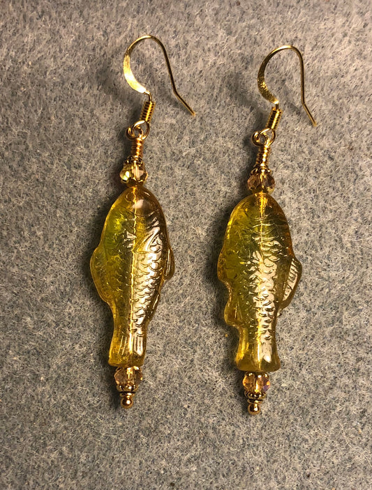 Amber and green Czech glass fish bead earrings adorned with amber Chinese crystal beads.