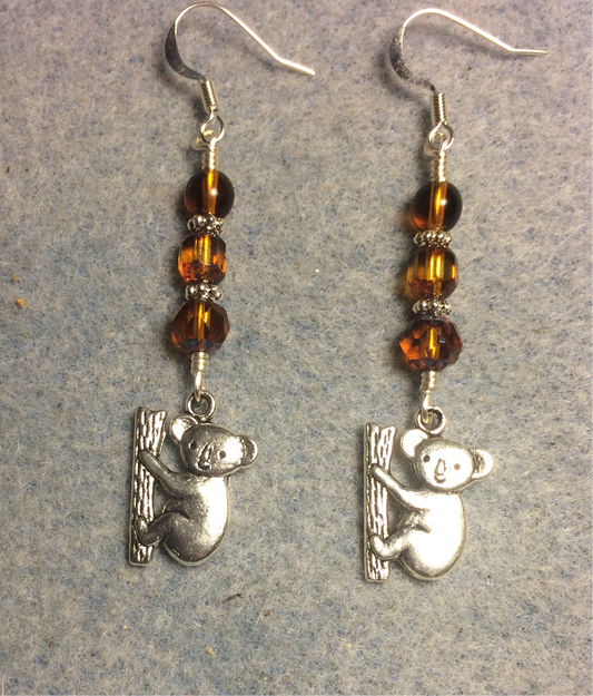 Silver koala bear charm earrings adorned with topaz Czech glass beads