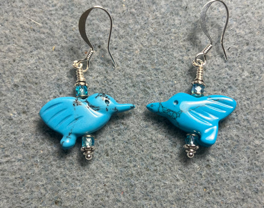 Small turquoise howlite gemstone hummingbird bead earrings adorned with small turquoise Czech glass beads.