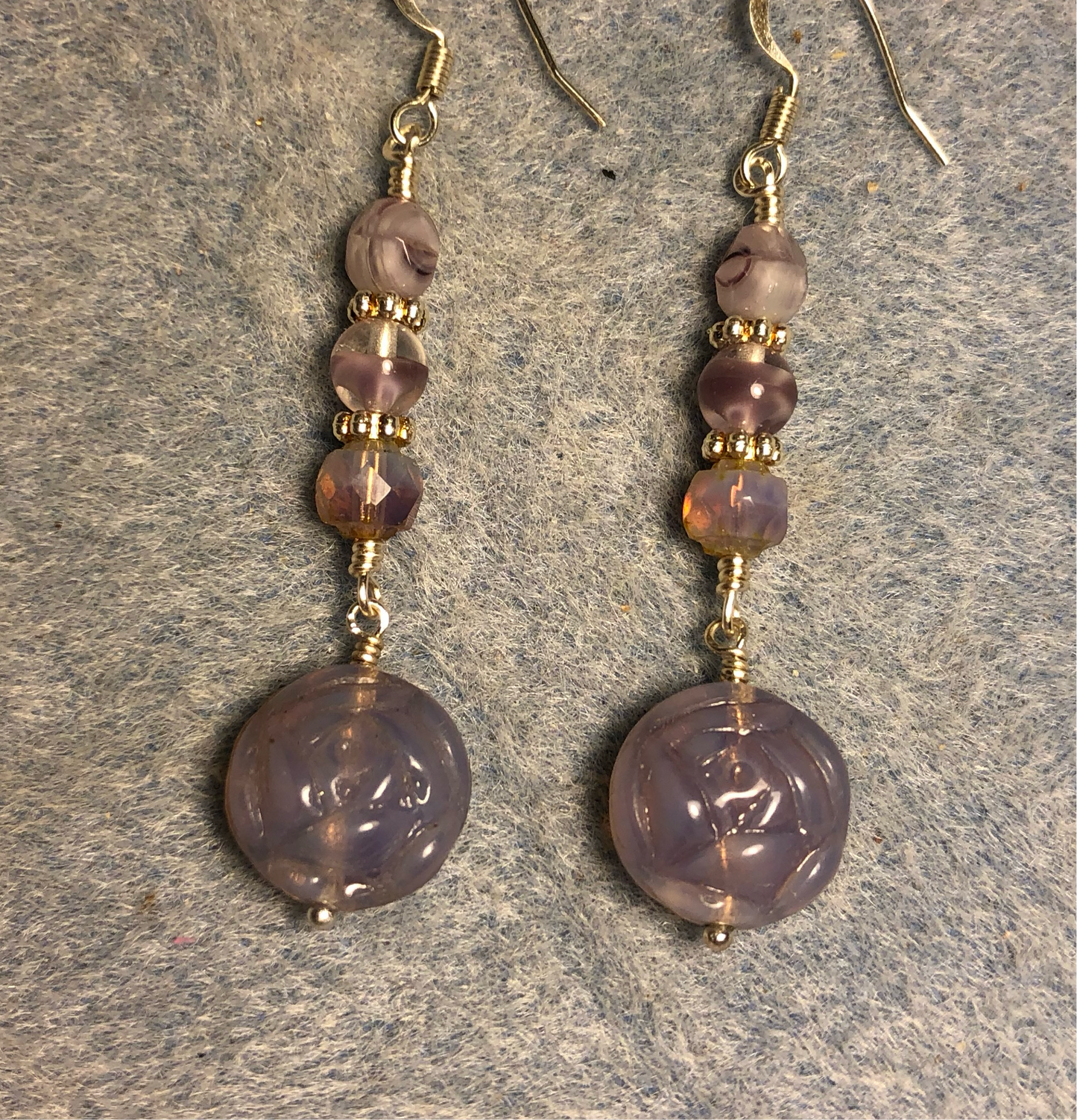 Violet carved glass rose bead earrings adorned with violet Czech glass beads.