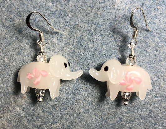 Opaque off white and pink lamp work elephant bead earrings adorned with clear Chinese crystal beads.