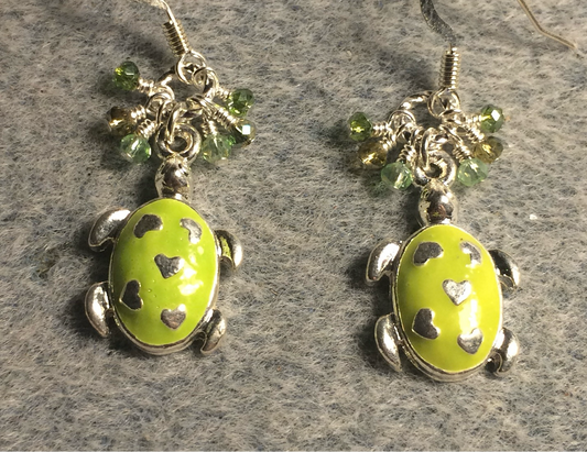 Silver and lime green enamel turtle charm earrings adorned with tiny dangling lime green and light green Chinese crystal beads.