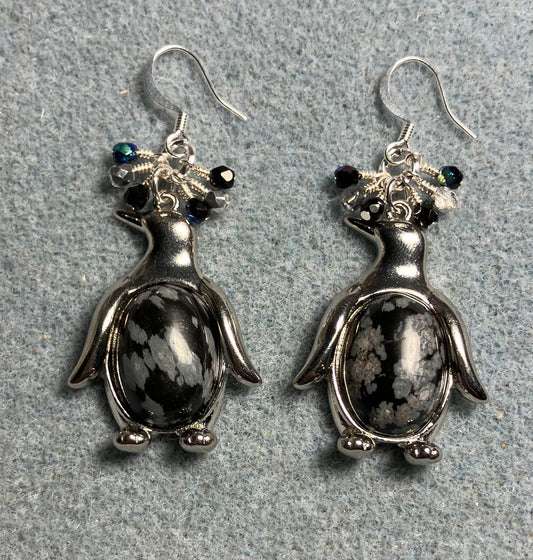 Large silver and snow jasper gemstone penguin charm earrings adorned with small dangling black and silver Czech glass beads.