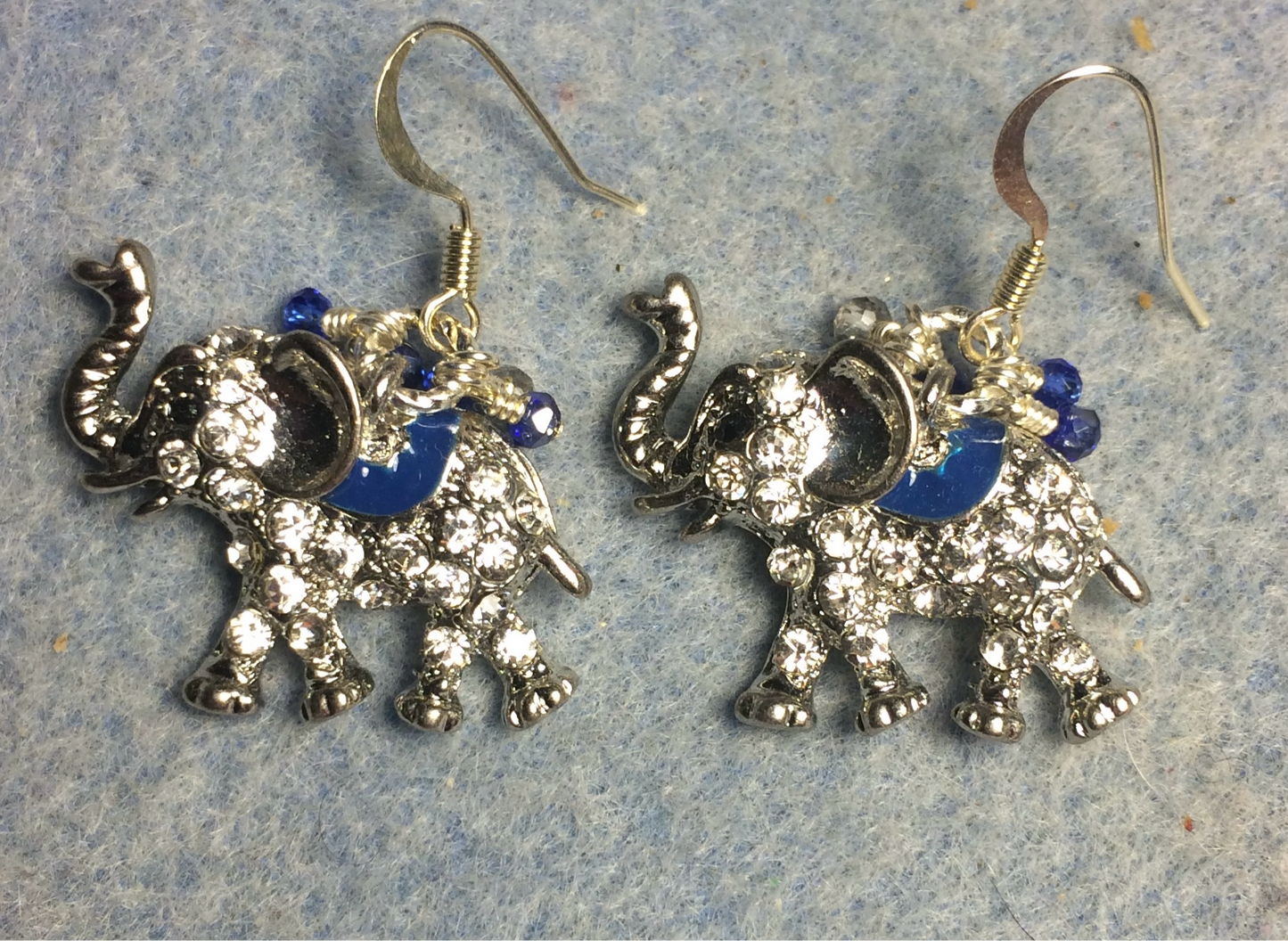 Silver and blue enamel and rhinestone elephant charm earrings adorned with tiny dangling silver and blue Chinese crystal beads.