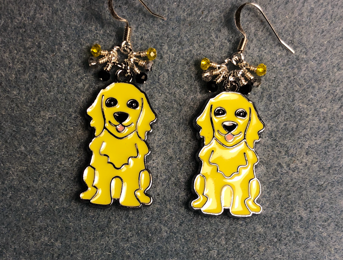 Yellow enamel Golden Retriever charm earrings adorned with tiny dangling black, yellow, and silver Chinese crystal beads.