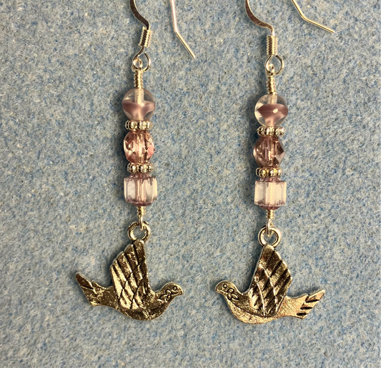 Silver flying dove charm earrings adorned with light violet Czech glass beads