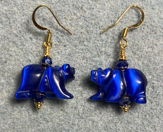 Large dark blue fiber optic (cat’s eye) bear bead earrings adorned with dark blue Chinese crystal beads.