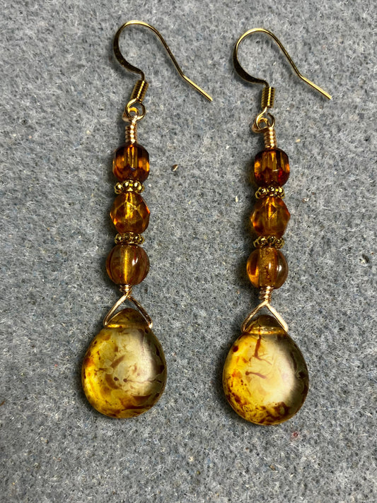Amber brown Czech glass pear drop bead earrings adorned with amber Czech glass beads.