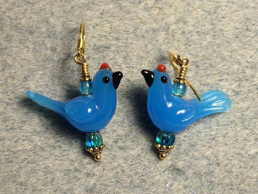 Opaque turquoise blue lamp work songbird bead earrings adorned with turquoise Czech glass beads.