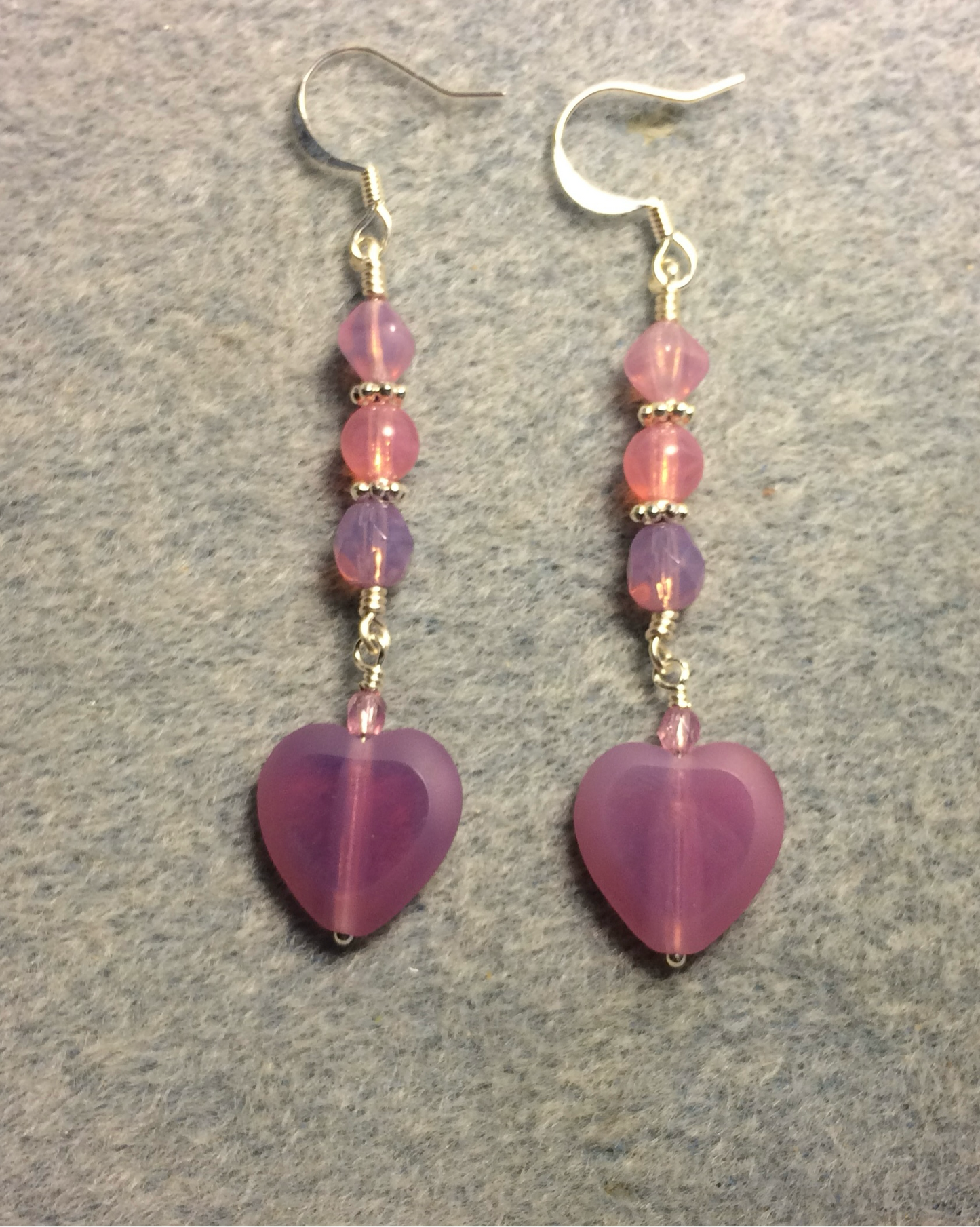 Opaque purple pink Czech glass heart bead earrings adorned with purple pink Czech glass beads.