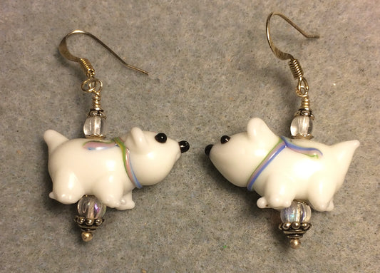 White lamp work polar bear bead earrings adorned with clear Czech glass beads.