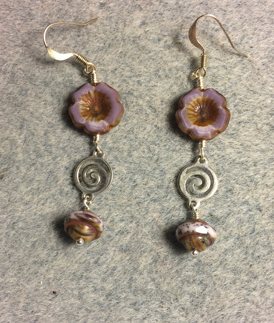 Violet silk Czech glass pansy bead earrings adorned with silver swirly connectors and violet Czech glass Saturn beads.