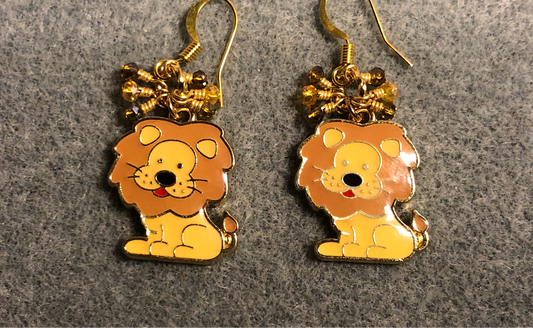 Amber and brown enamel lion charm earrings adorned with tiny dangling amber and brown Chinese crystal beads.