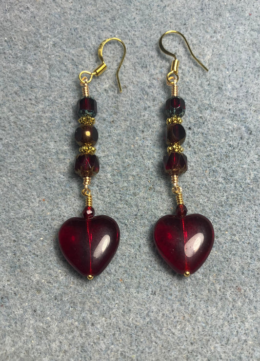 Ruby red Czech glass heart bead earrings adorned with ruby red Czech glass beads.